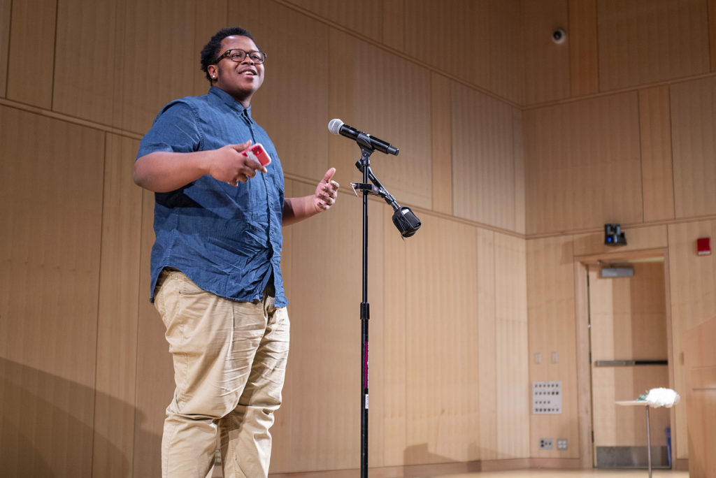 826 Boston student Tariq performs his poetry at the Boston Public Library.