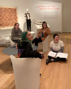 Students brainstorm writing ideas during a field trip to the Peabody Essex Museum.